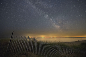 beach and starry sky at sunset