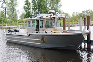 A patrol boat used by the Great Lakes Enforcement Unit is shown.