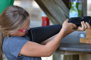 A target shooter takes aim at the pellet gun range at the Pocket Park.