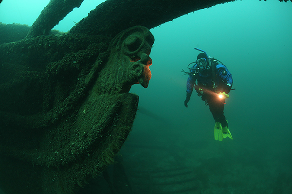 Dan Friedhoff of the Michigan Underwater Preserves Council dives on the wreck of the Sandusky. 