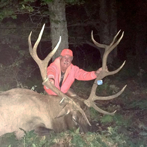 Greg Burks with a harvested bull elk. 