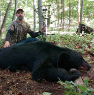 Jesse Jubb with harvested black bear
