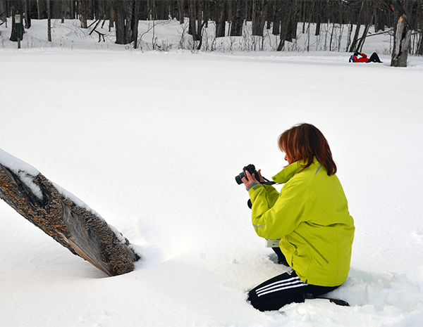 Two photographers enjoy the snowy outdoors at a past BOW event in Marquette County.