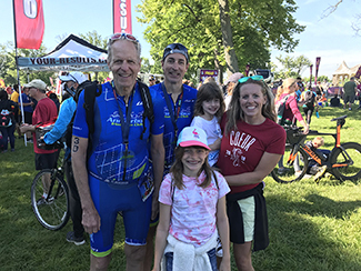 DNR Parks and Recreation Division Chief Ron Olson with family at triathalon