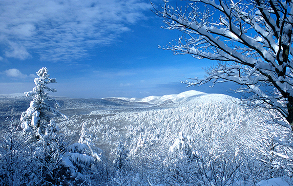 The snow-covered Porcupine Mountains are shown.