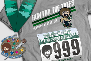Happy Little 5K race bib, medal, T-shirt and Bob Ross, Michigan State Parks pain easel graphic