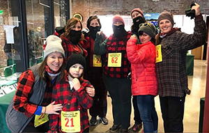 group dressed in lumberjack attire