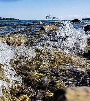 Water splashing on rocks at Belle Isle