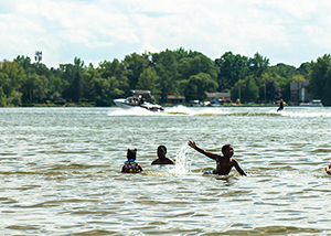 Kids swimming in the lake