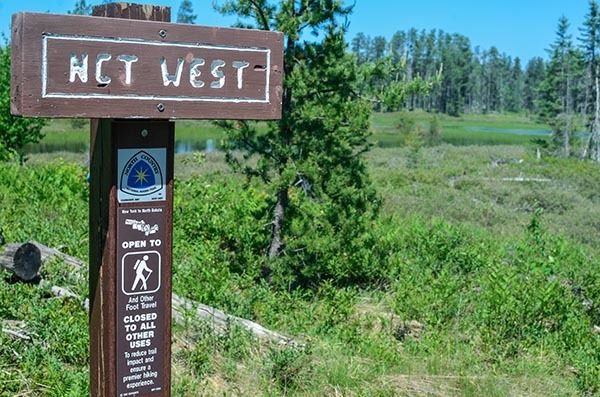 A sign points out the North Country National Scenic Trail near Big Lake State Forest Campground in Baraga County.