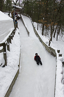 Person on luge track at Muskegon State Park