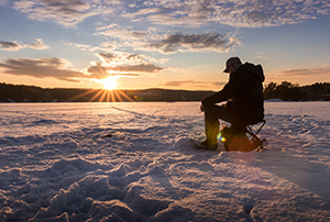 man fishing on the ice