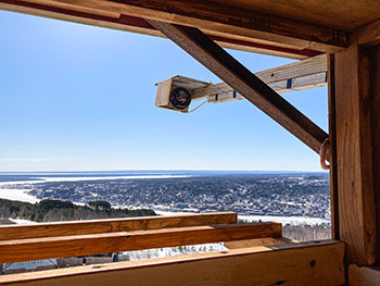 A bird's eye view of the surrounding landscape is shown from inside a nest box installed at the Quincy Mine.