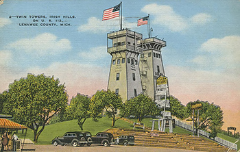 An old color postcard shows the twin towers.