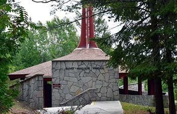 Father Marquette National Memorial is a stone pavilion with wooden roof