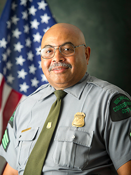 A Michigan DNR photo shows Conservation Officer Green in his uniform.