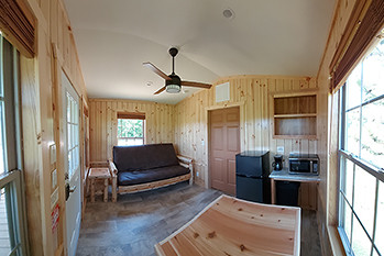 A lodging interior is shown from Pontiac Lake State Park.