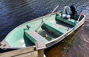 A boat is shown that two overdue canoeists were downstream in Monday morning after they abandoned their canoe.