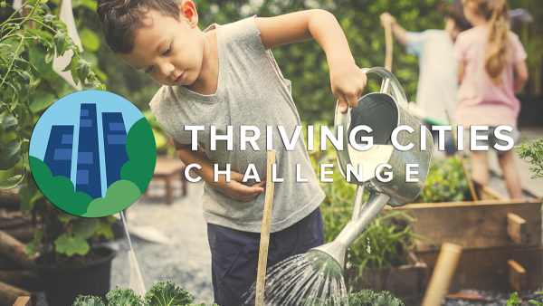 Thriving cities challenge banner image, with logo and child with a watering can