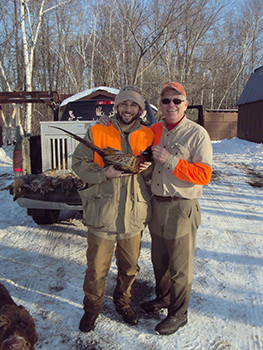 Alex Beachum and his father Jimmy after a pheasant hunt