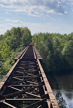 The trestle over the Menominee River is shown with the decking removed.