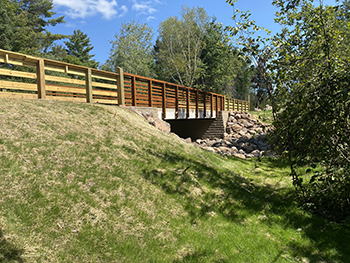 A completed bridge project is shown over McVichie Creek in Gogebic County.