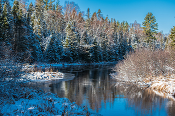 A beautiful wintry river scene is shown from Iron County.
