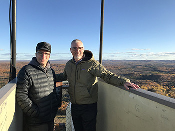 A view from the Copper Peak ski tower is shown with Bob Jacquart and Brad Garmon.