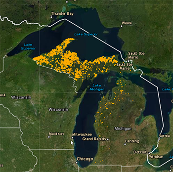A Michigan map shows the distribution of Commercial Forest lands across the state.