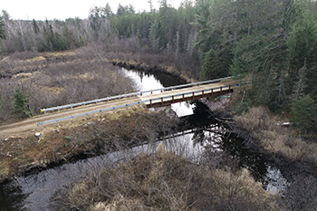 An aerial photo shows the new bridge over the Black River in Marquette County.