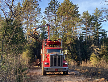 Steel beams are lifted into place for the new bridge support structure.