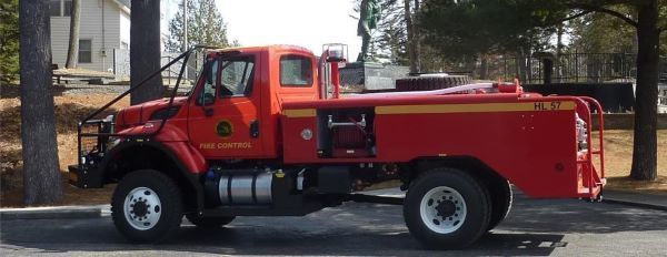 A red, 800-gallon fire truck developed for DNR fire control staff