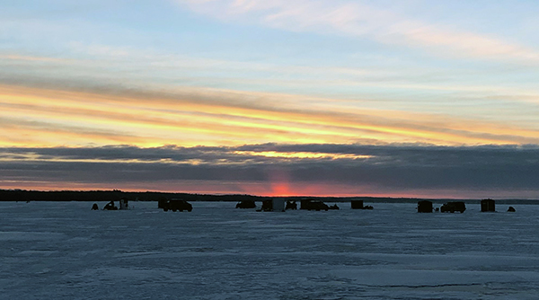 A beautiful morning sky greets anglers on Black Lake as the sturgeon season began at 8 a.m.