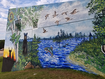 Part of the outdoor mural is shown at the DNR Customer Service Center in Escanaba.