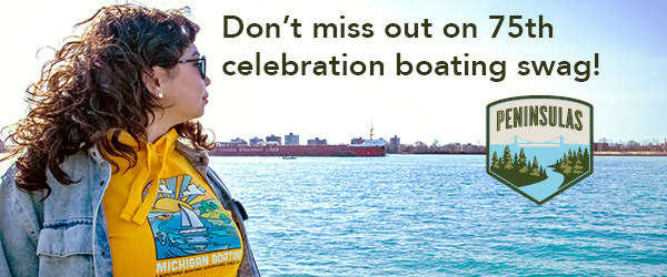 Don?t miss out on 75th  celebration boating swag tagline with woman looking at water with boat