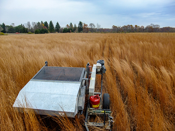 A seed stripper machine is shown at work at the Fort Custer Recreation Area in Kalamazoo County.