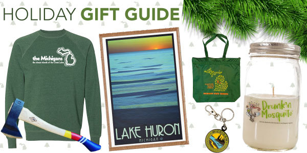 Holiday gift guide with sweatshirt, tote, candle, axe and keychain