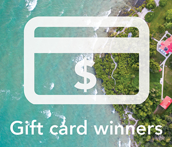 Gift card winners with gift card icon and bird's eye view of land and and water