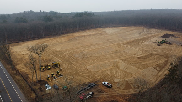 An aerial photo view of construction with earth moving equipment at the Barry State Game Area.