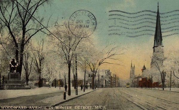 pale blues, pinks, creams of street lined with snow-covered trees, statue at left, church on right, Woodward Avenue in Winter, Detroit, Mich. 