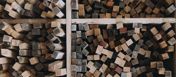 Neatly organized cut wood pieces in a shop