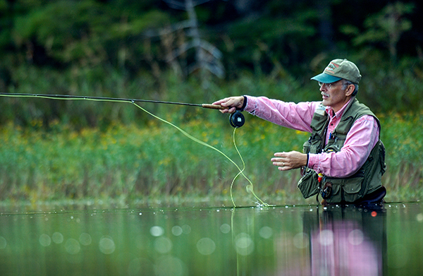 Jim Dexter enjoys flyfishing for brook trout on an Upper Peninsula pond.