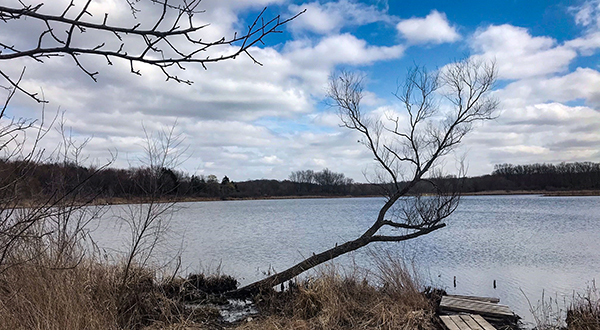 A view of Hampton Lake is shown on a partly cloudy day.