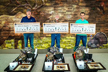 Three 2023 Pure Michigan Hunt winners with prize packages