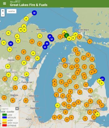 A map showing fire danger in Michigan with many areas marked "high" or "very high." 