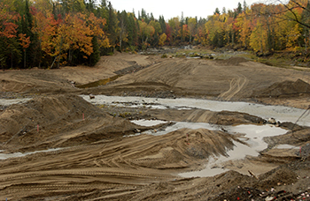 Another view of restoration work on the Dead River after the flood.
