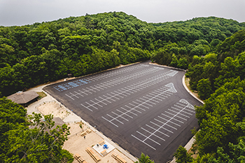 aerial image of newly paved parking lot at Hoffmaster State Park