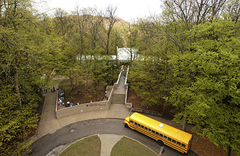 school bus dropping off students at Gillette Visitor Center