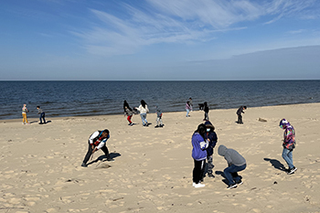 students explore Lake Michigan shoreline