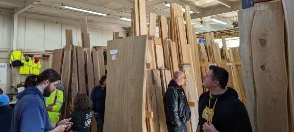 An urban wood facility in Detroit shows different types of boards and cut lumber